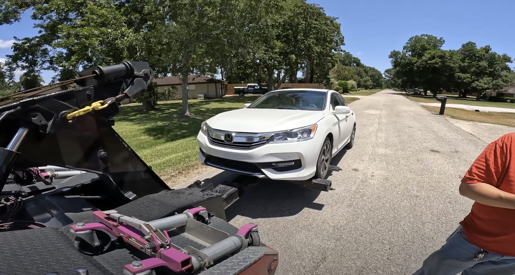 Professional Roadside Assistance Service Roadside assistance technician helping stranded motorist